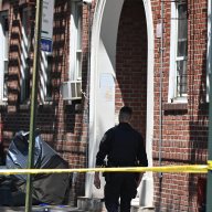 brooklyn police officer guards crime scene after man was shot