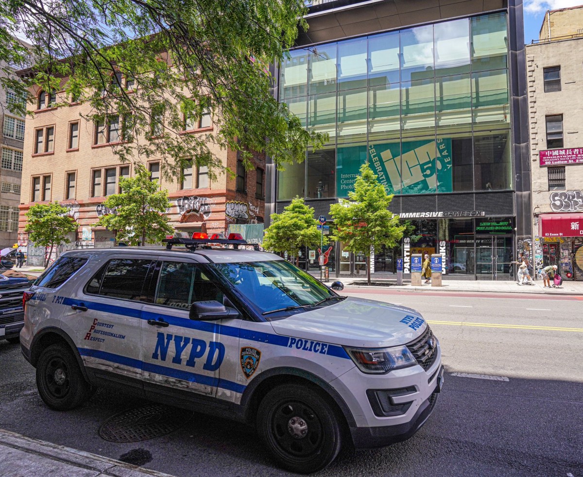 Police officers at the scene of the stabbing in the Lower East Side