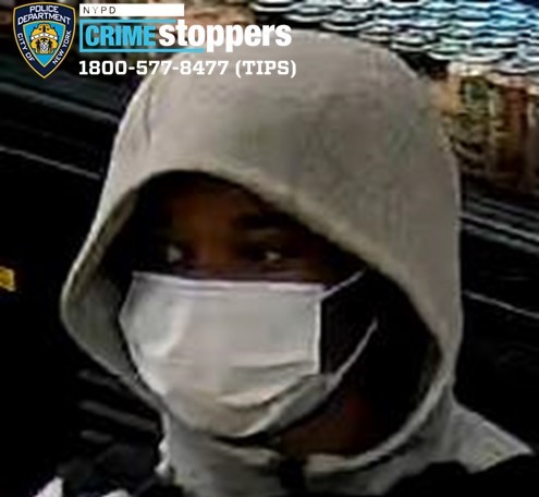 suspect in Bronx and Queens robbery wearing white mask