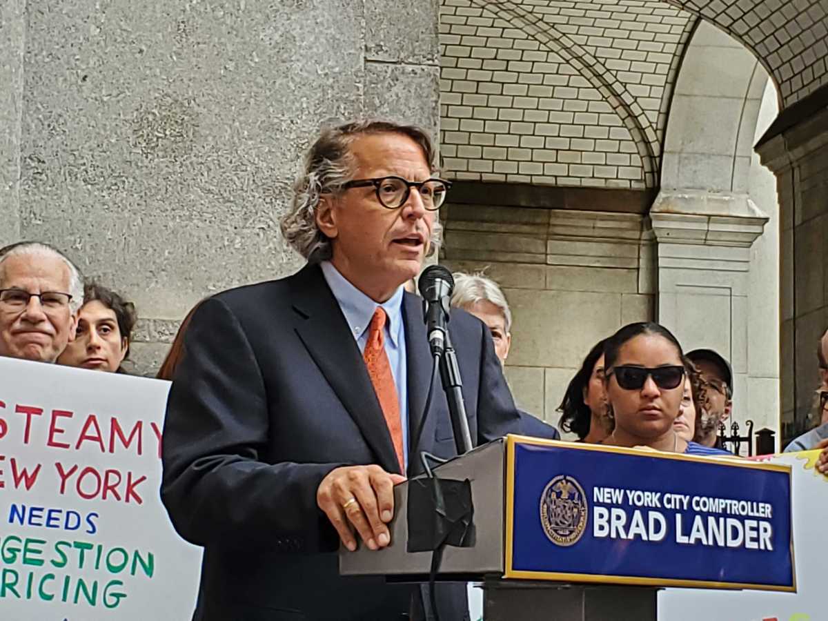 Attorney in congestion pricing lawsuit speaks at microphone