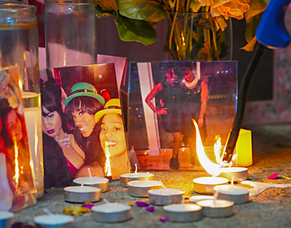 Williams’ loved ones laid flowers, lit candles, and propped up photos of the 31-year-old outside 207 East 27th Street, the same spot where she was found murdered