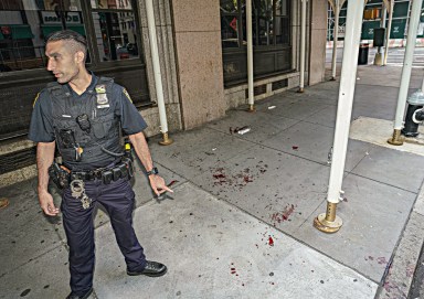 Police at scene of violent Manhattan robbery