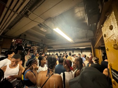 Commuters on crowded L train subway station during subway week of hell