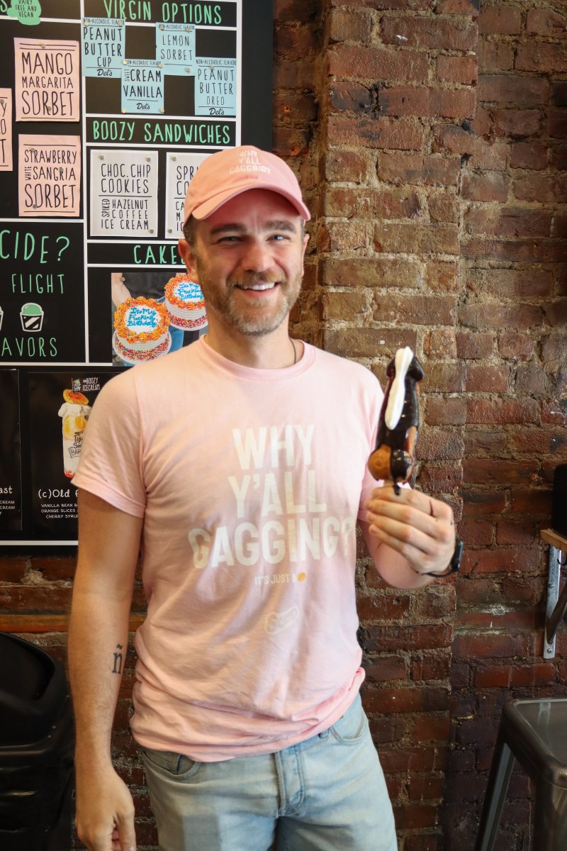 Austin Allan, founder of Sugar Wood, shows one of the Woody Waffles that comes on the Weenie Martini.