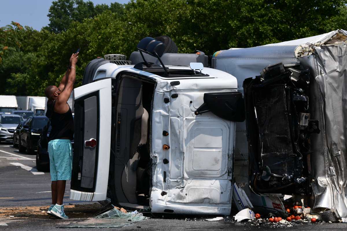 A worker responds to Bronx truck crash