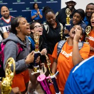 Girls celebrate win in Manhattan youth basketball tournament