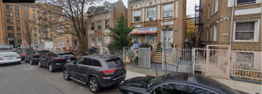 row of homes on a street in the Bronx