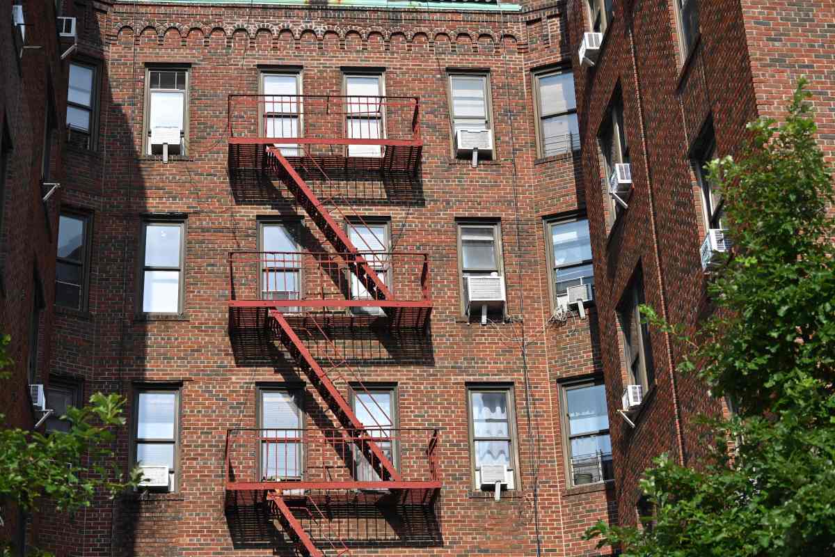 The exterior of the apartment building in Bensonhurst, Brooklyn where four people, including two young children, were found stabbed to death