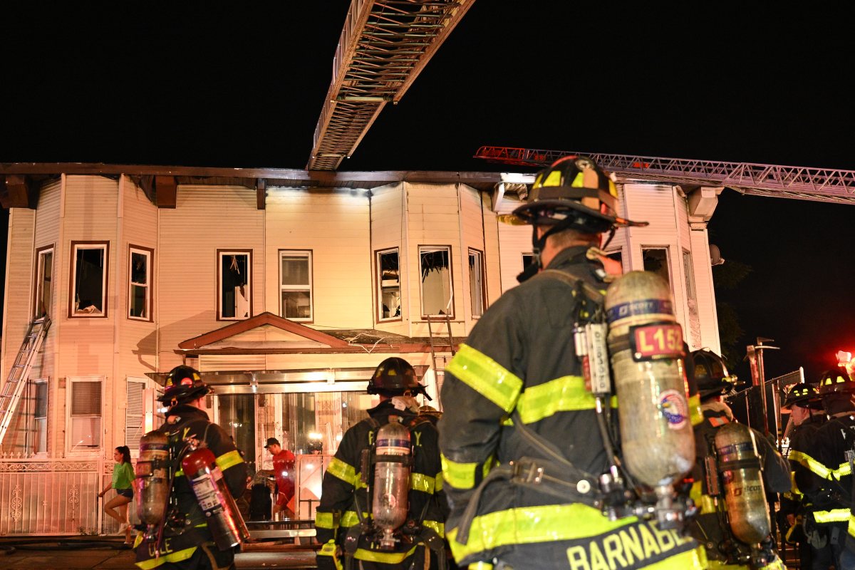 Firefighters rescued numerous residents over ground ladders during a three alarm fire at 168-20 Liberty Ave. in Queens on Sunday, July 28.