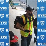 man wearing yellow vest in Gramercy Park in Manhattan