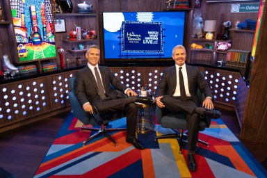 Andy Cohen (r) and his wax figure