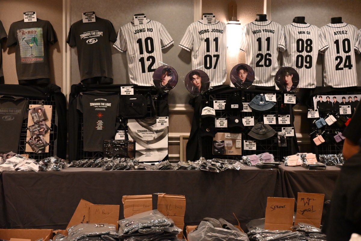 A merch table at the ATEEZ pop-up.