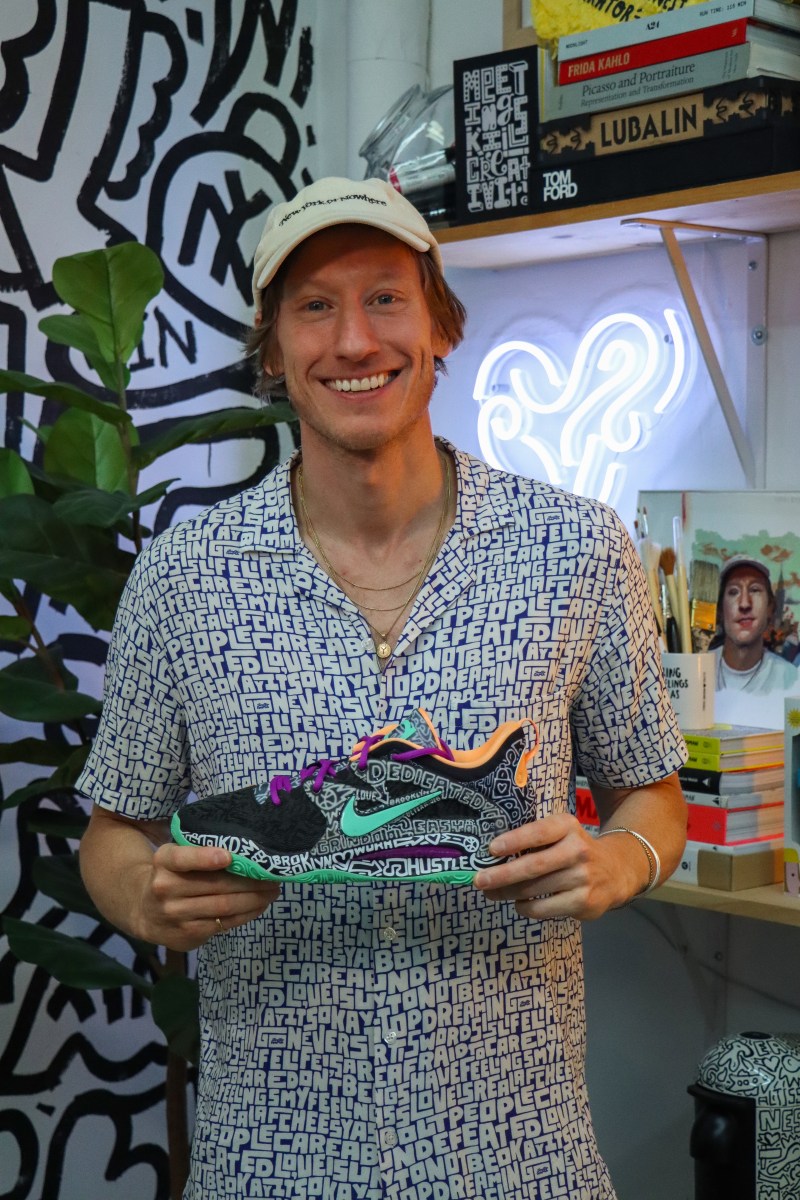 Timothy Goodman holding a sneaker