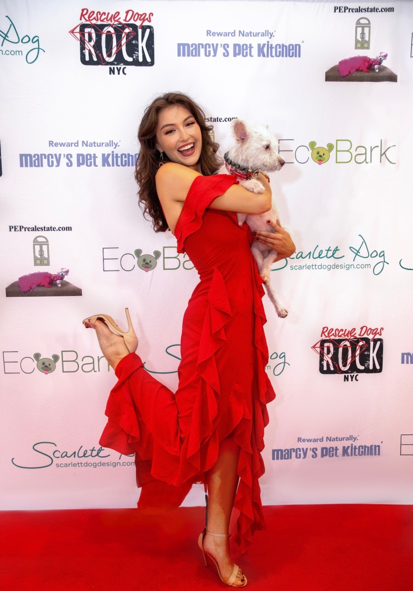 Rachel Pizzolato walking the runway with a friend at the Rescue Dogs Rock NYC and ChanceTV's dazzling fashion spectacle, "Furry, Fashionable and Fabulous."