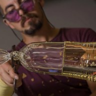 Sculpture artist Dylan Martinez working on glass