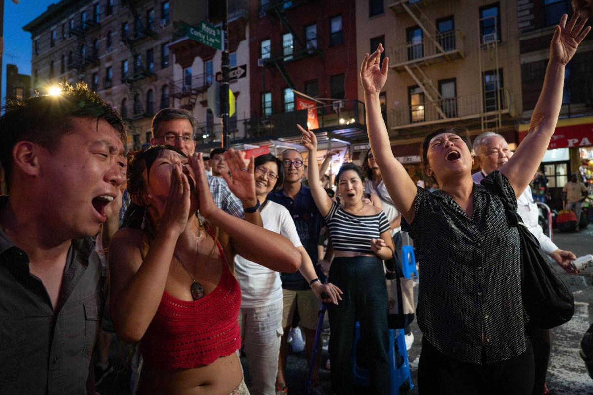 Community members sing Cantonese songs.