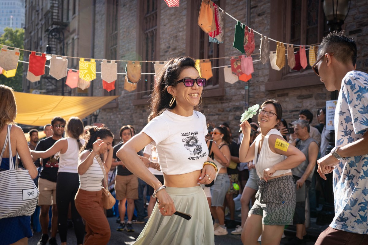 DJ Rochelle “Yiu Yiu” Kwan enters the dance floor.