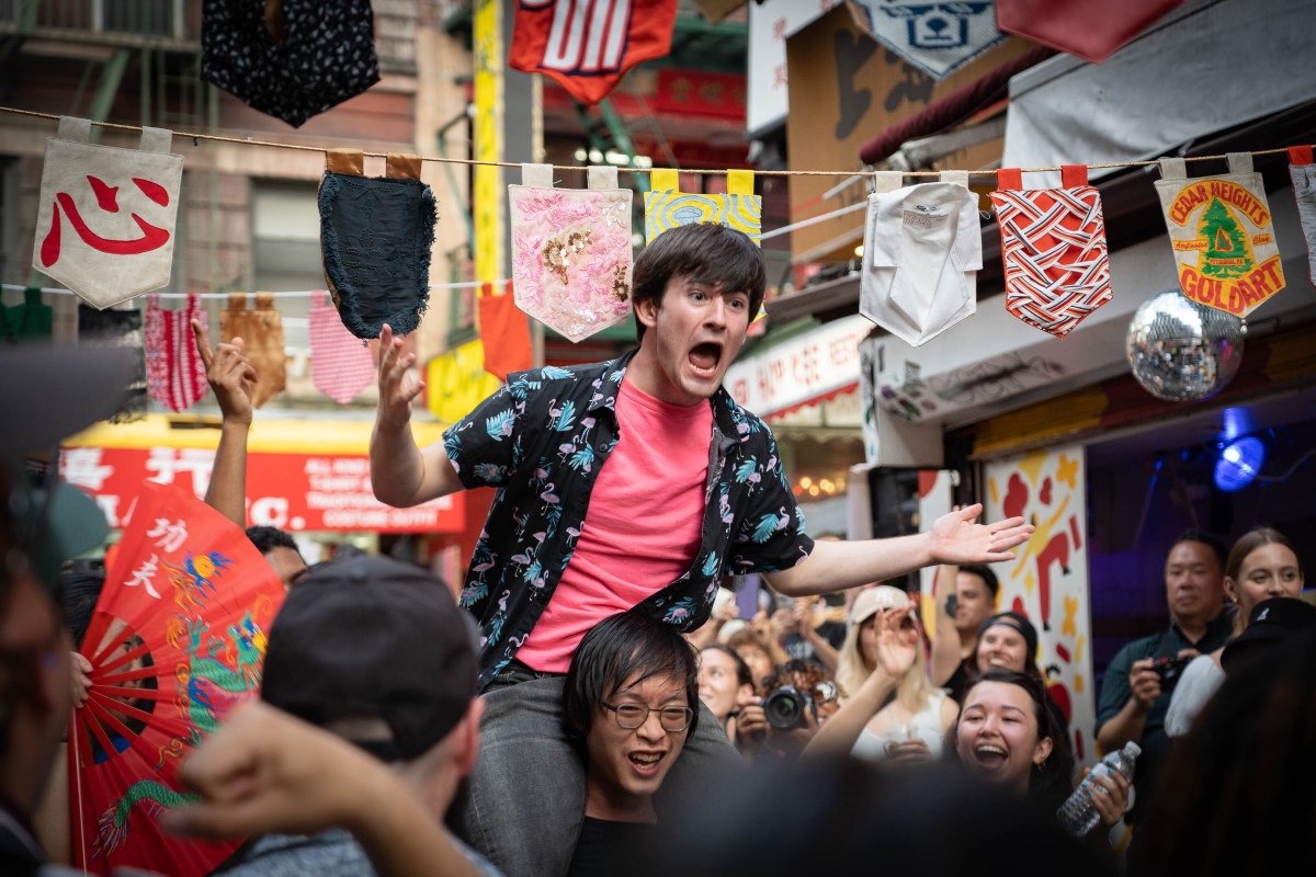 Guests celebrate a block party in Chinatown.