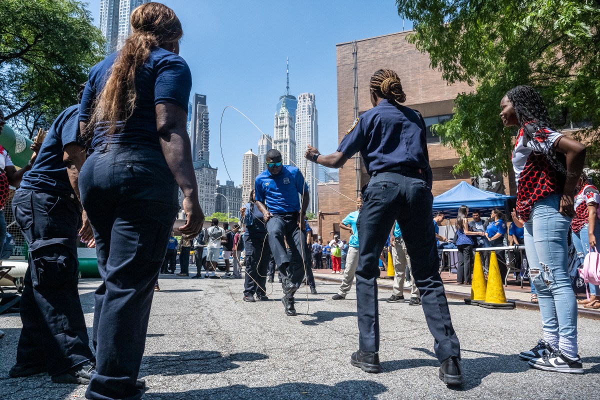 An NYPD Officer shows off his double dutch skills.