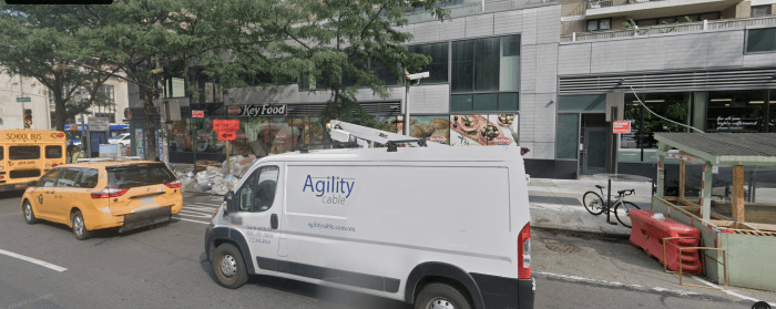 supermarket and white van on Upper West Side in Manhattan