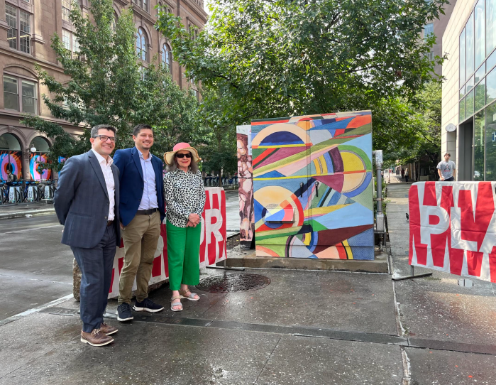 people around an art installation in Greenwich Village