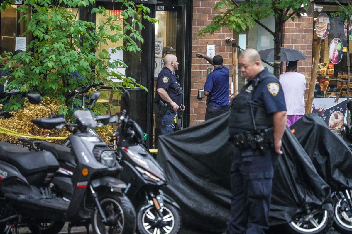 Cops investigate a shooting in the Upper East Side