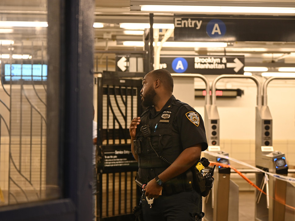 NYPD officer in Queens Subway station