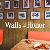 a wall in one of several NYC pizzerias that will display photos of 9/11 first responders