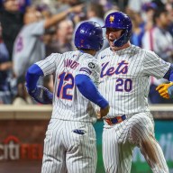 Francisco Lindor and Pete Alonso of the Mets celebrate a home run