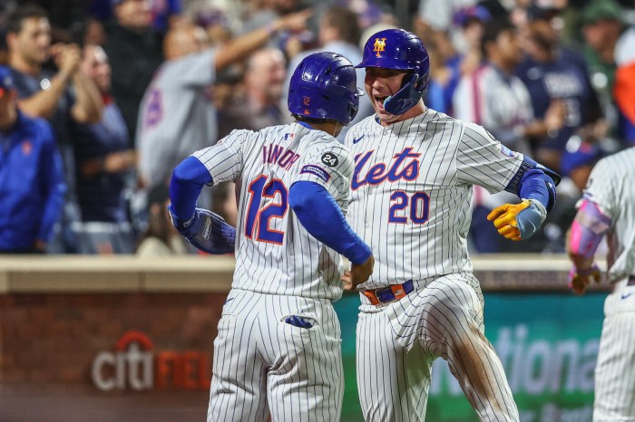 Francisco Lindor and Pete Alonso of the Mets celebrate a home run