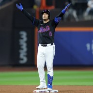 Mets' Jose Iglesias celebrates after hitting a double