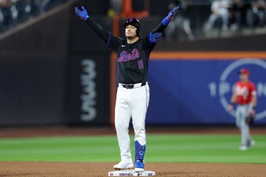 Mets' Jose Iglesias celebrates after hitting a double