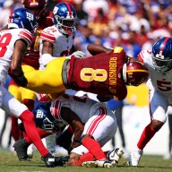 Giants defense tackles Commanders' Brian Robinson Jr.