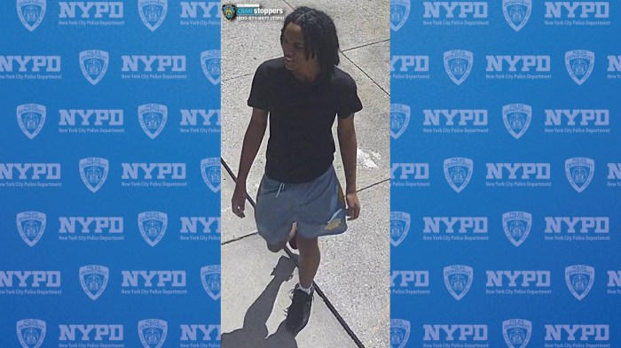 person wearing shorts and black shirt who is wanted for allegedly robbing people in two separate Manhattan robberies.