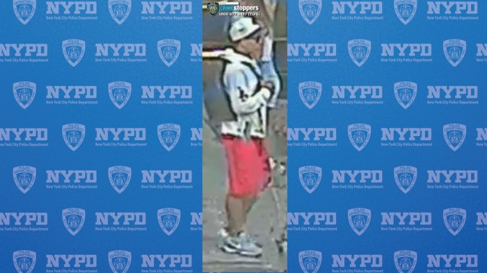 suspect  wearing white hat and red shorts who allegedly robbed a woman on Manhattan's West Side. 