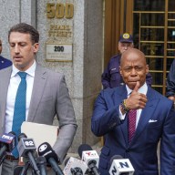 Mayor Adams with attorney gives a thumbs up after arraignment on indictment