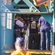 Police investigate a shooting at the Sutter Avenue station on the L line in Brooklyn on Sept. 15, 2024, that left four people, including a police officer, wounded.