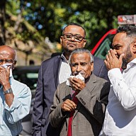 Bronx residents hold masks after gas main rupture