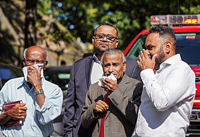 Bronx residents hold masks after gas main rupture