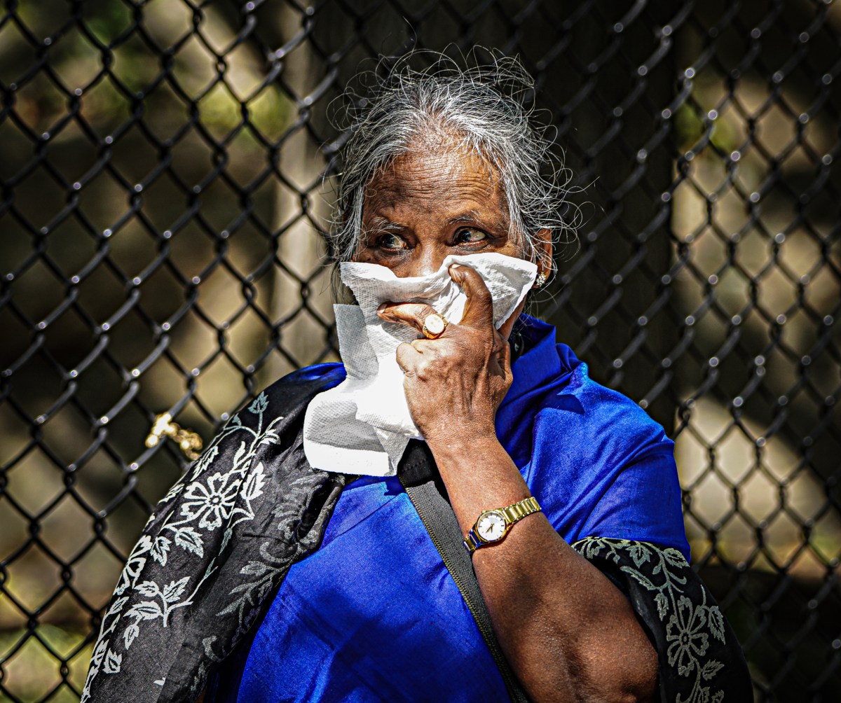 A dense smell filled the area following the Bronx gas main rupture, forcing onlookers to cover their faces with tissues and their shirts.