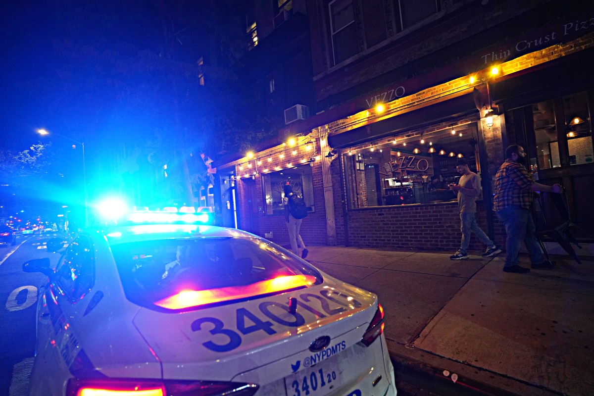 Police at scene of restaurant in Manhattan that was vandalized