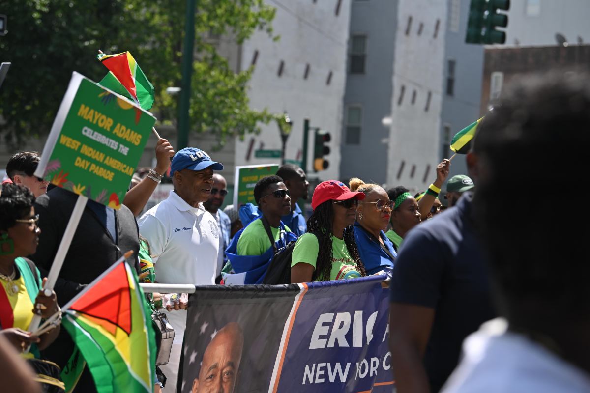 Mayor Adams marching during the Brooklyn parade