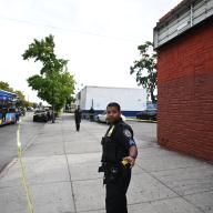 Police outside Brooklyn high school where teen was shot