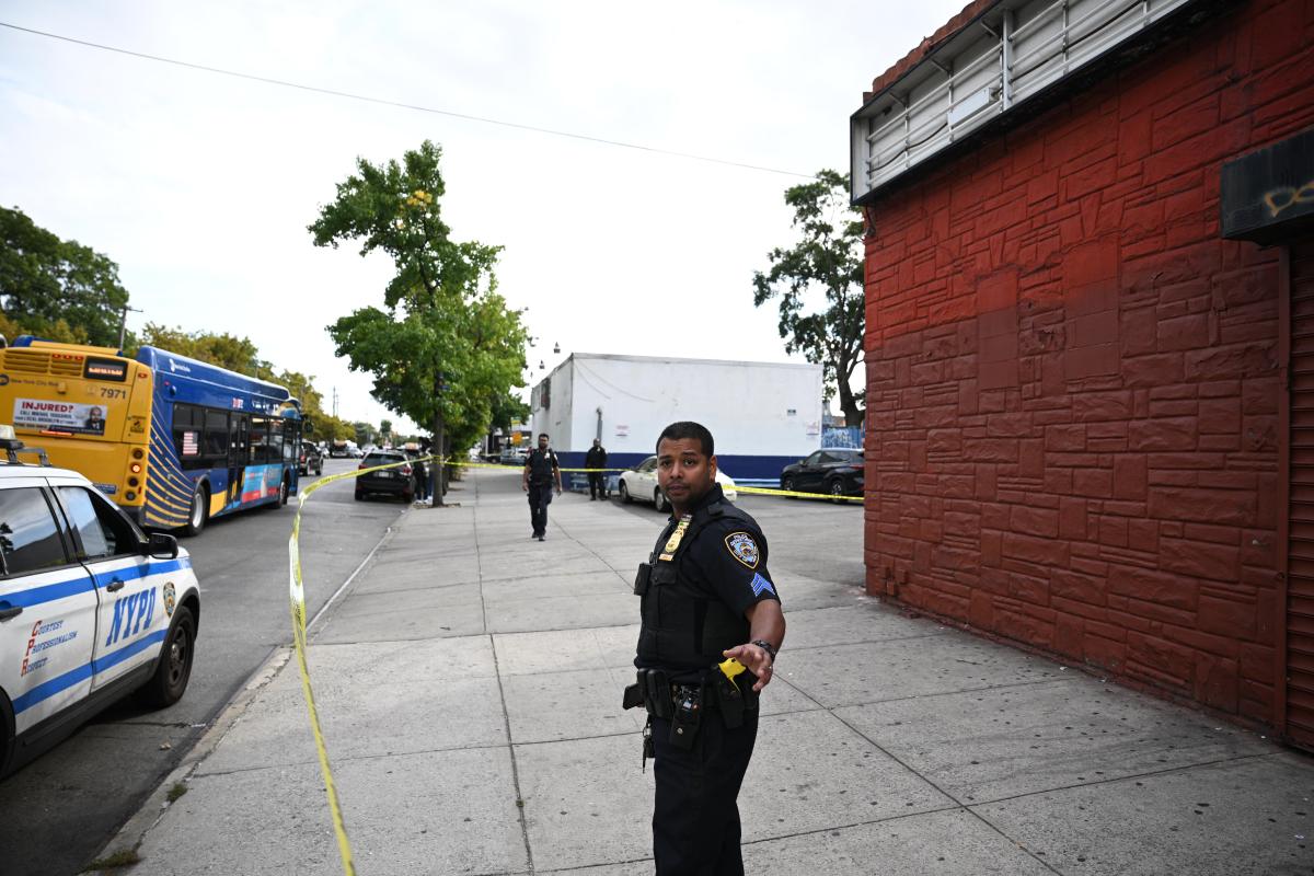 Police outside Brooklyn high school where teen was shot