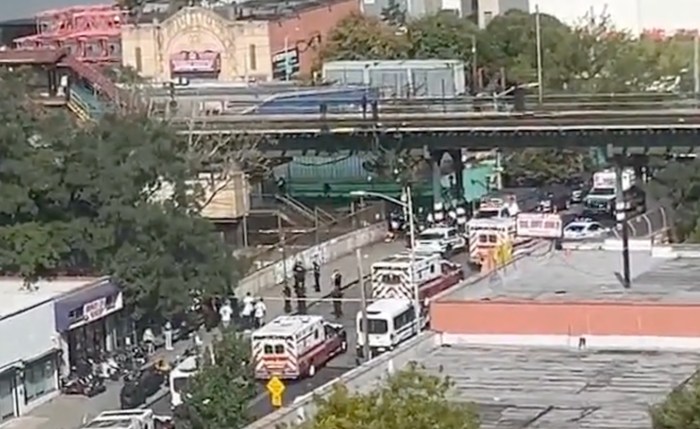 Numerous police vehicles and ambulances lined up near the Sutter Avenue station on the L line in Brooklyn following a shooting on Sept. 15, 2024.