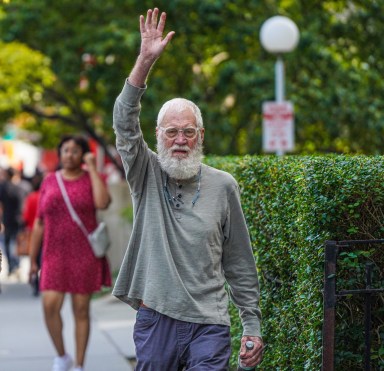 David Letterman waves while heading to jury duty