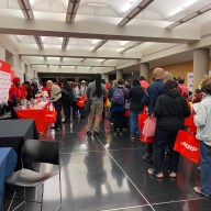 people at a Schneps Media and AARP event about financial empowerment.