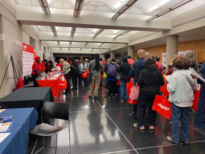 people at a Schneps Media and AARP event about financial empowerment.