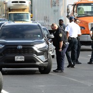 cops in NYC during a "ghost plates" operation