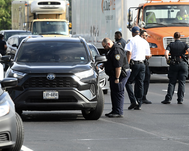 cops in NYC during a "ghost plates" operation